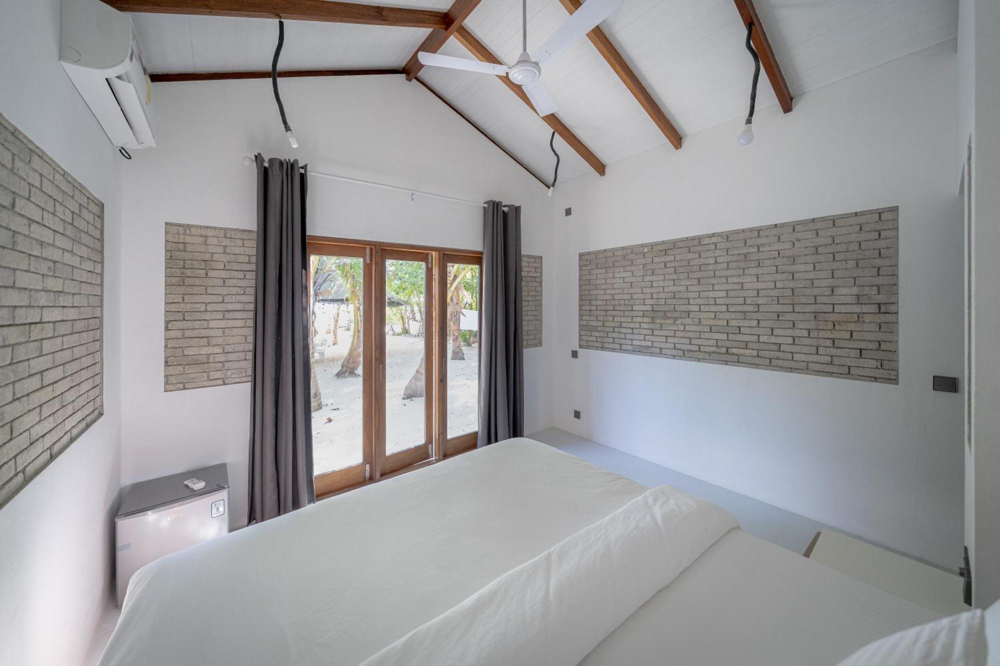 Brickwood Rasdhoo- Beach Front Buitenkant foto